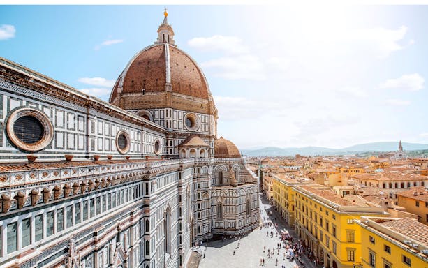Santa Maria del Fiore dome and Florence cityscape view.