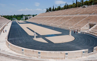 Panathenaic Stadium in Athens with empty stands and a central track.