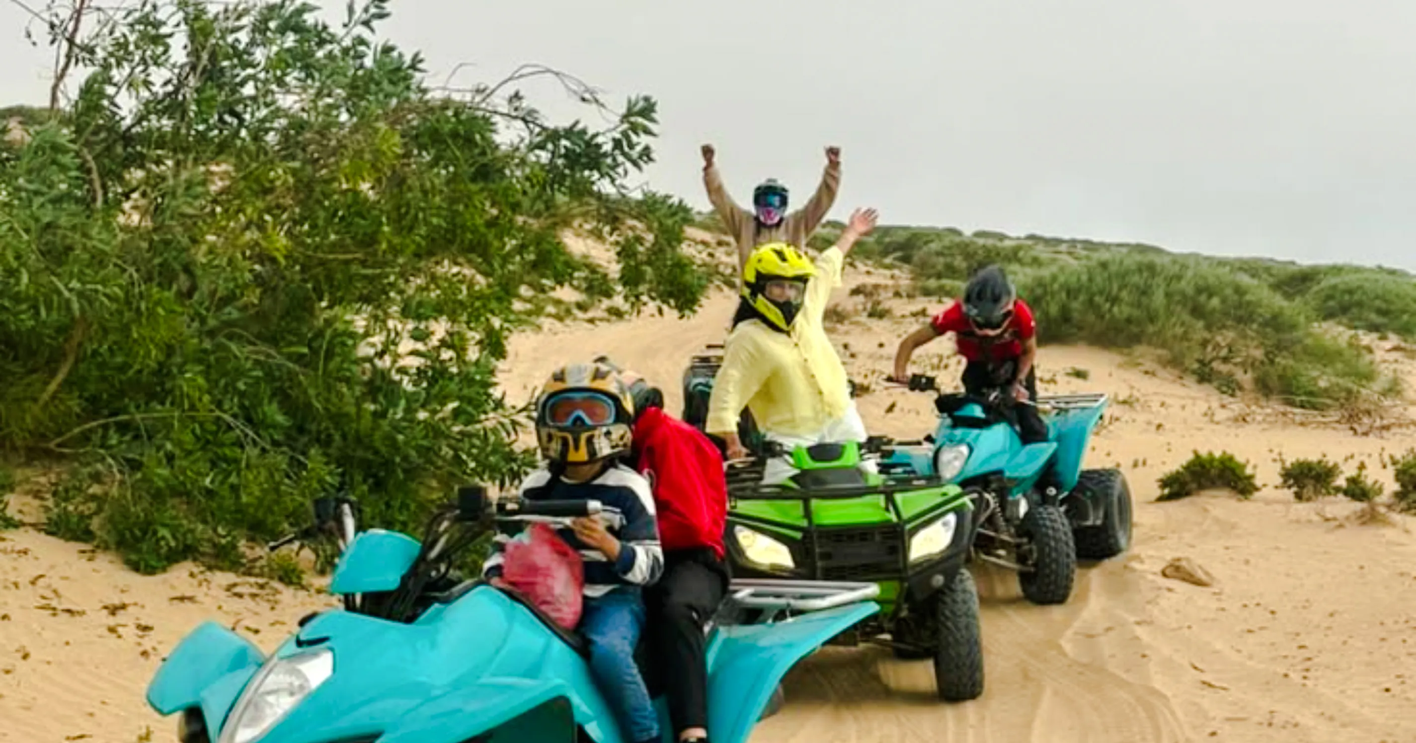 ATV riders on sandy trail during multi-day Morocco road trip from Essaouira.