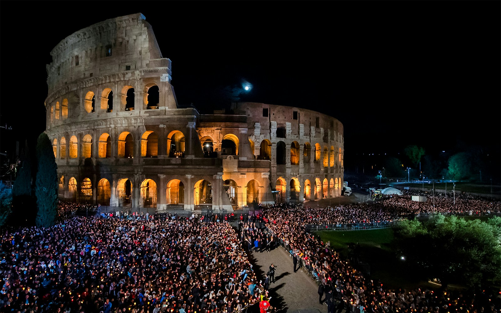 Pope Francis leads Via Crucis torchlight procession at Rome's Colosseum on Good Friday.