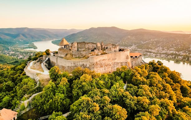 Visegrád Castle overlooking the Danube River during a full-day cruise with medieval show and banquet.