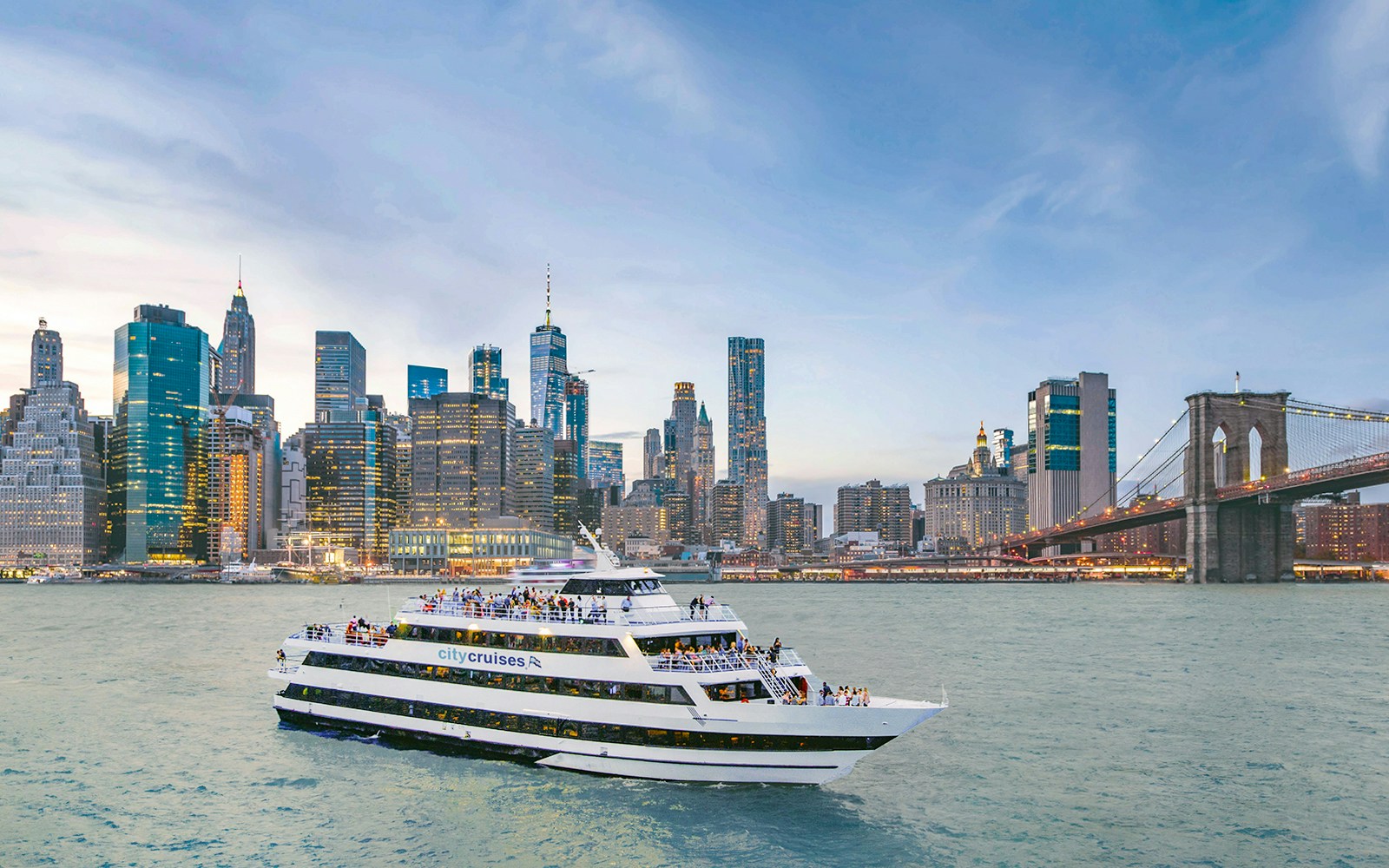 Skyline view of New York City from a dinner cruise boat on the Hudson River.