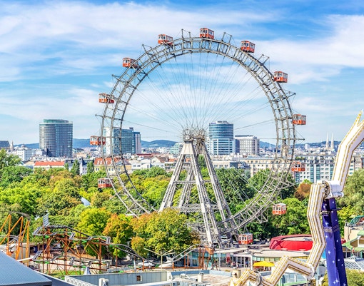 Giant Ferris Wheel at the Prater in Vienna with cityscape view.