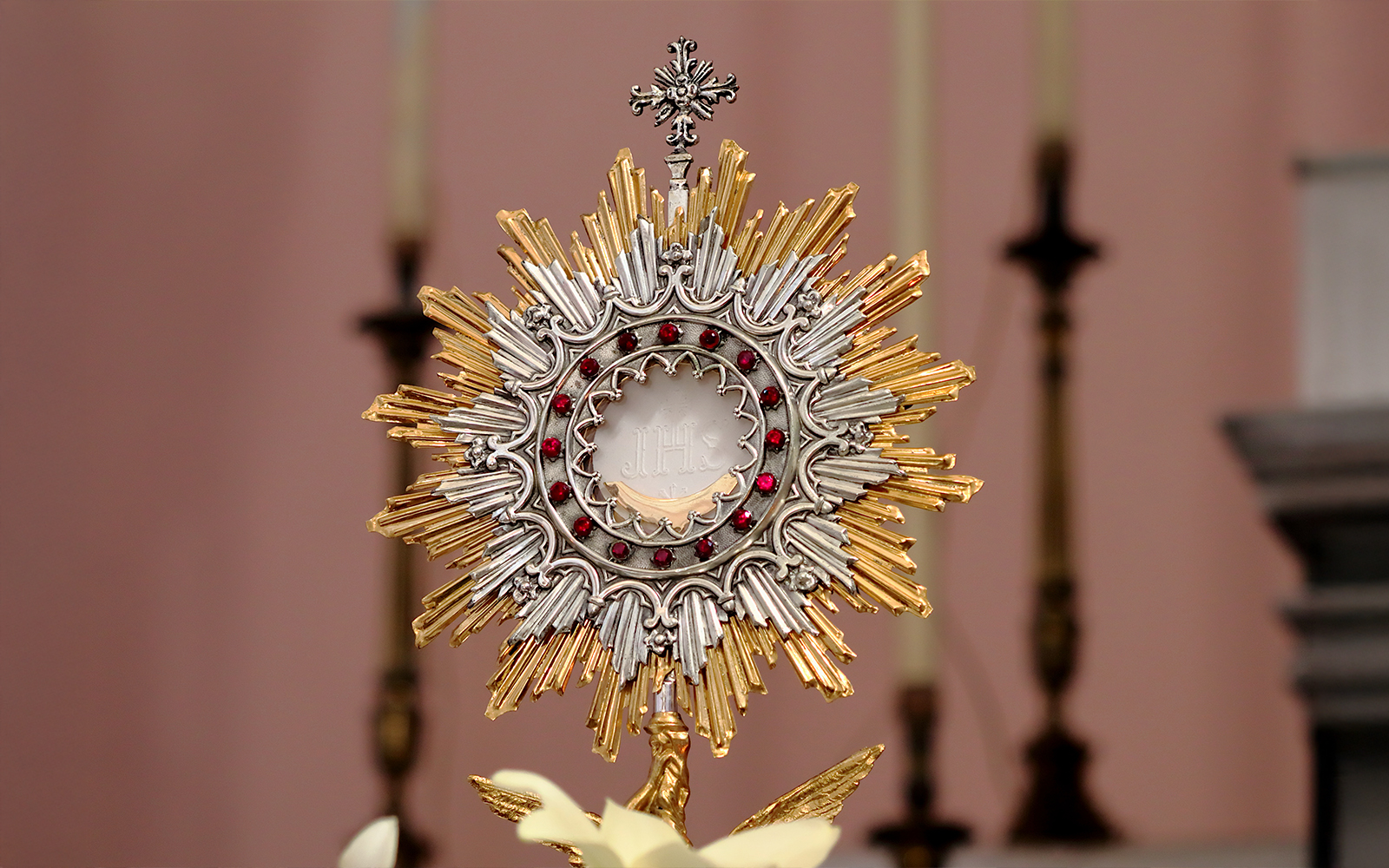 Eucharistic Adoration ceremony inside a historic church.