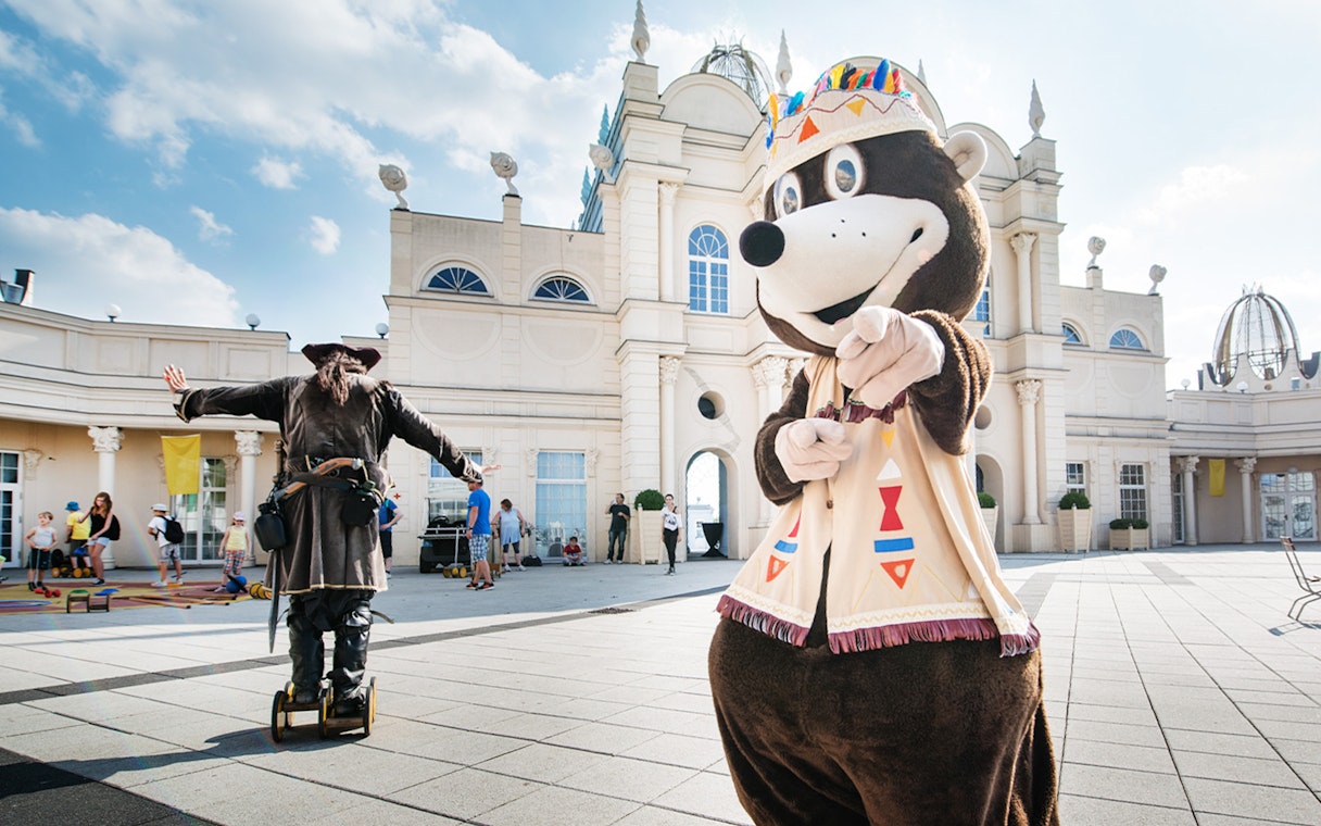 Mascot and performer at Belantis main entrance, Leipzig theme park.
