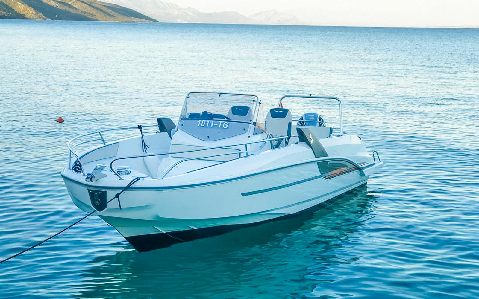 Speedboat anchored in clear waters during Blue Lagoon, Solta & Trogir tour.
