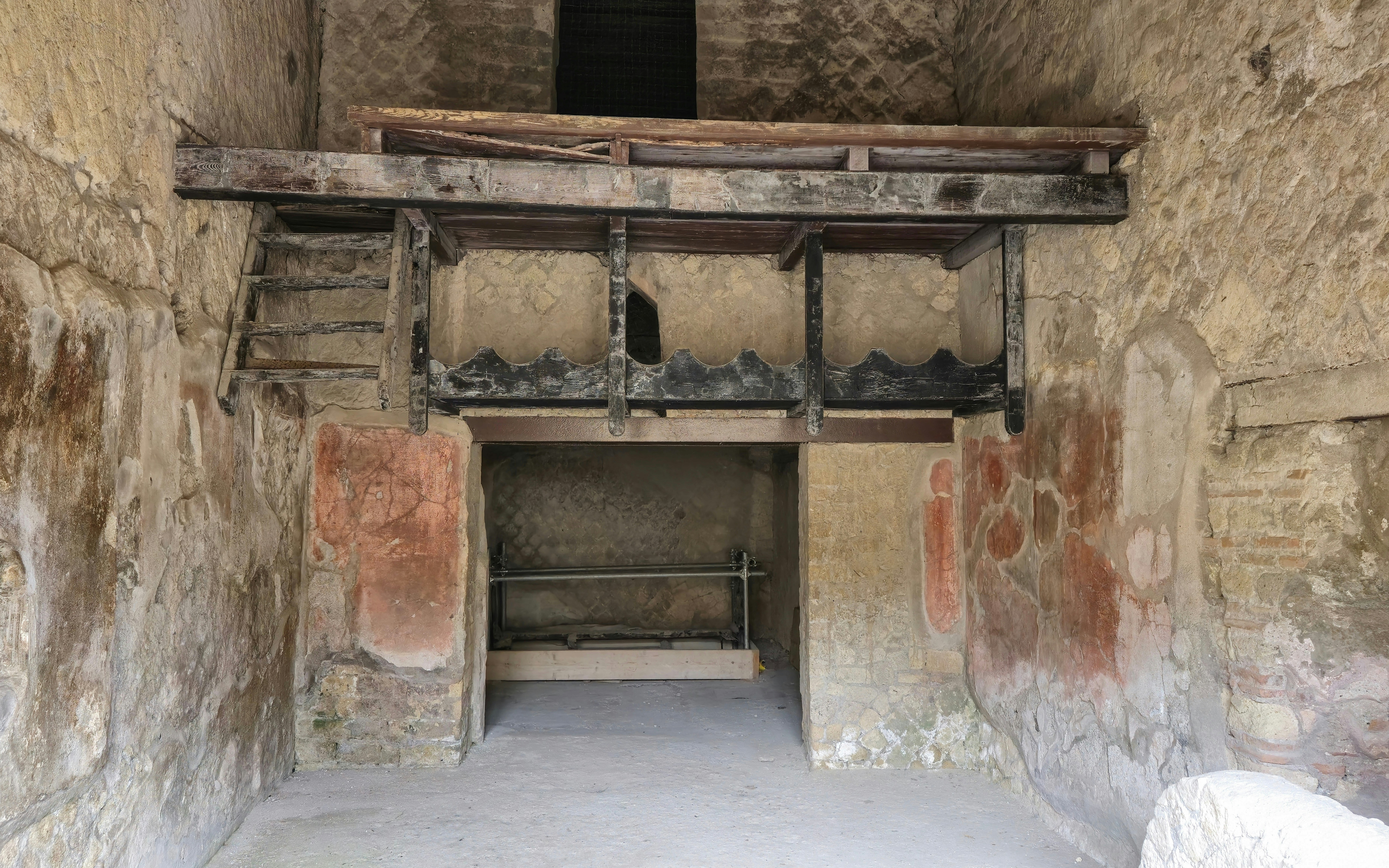 Carbonised wooden shelves in an ancient room at Herculaneum, Italy.