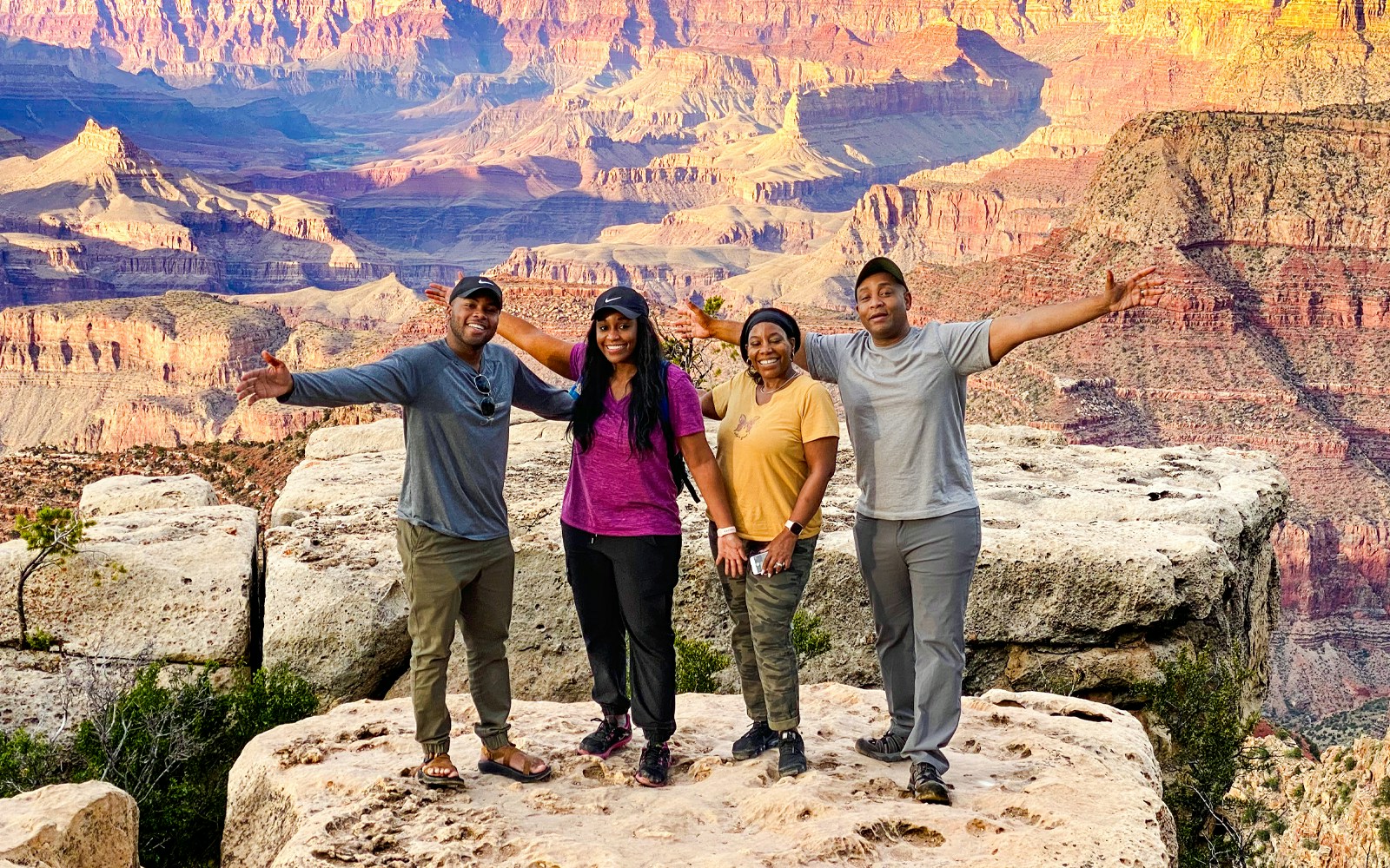 Group enjoying Grand Canyon view on Las Vegas to Grand Canyon airplane and Hummer tour.