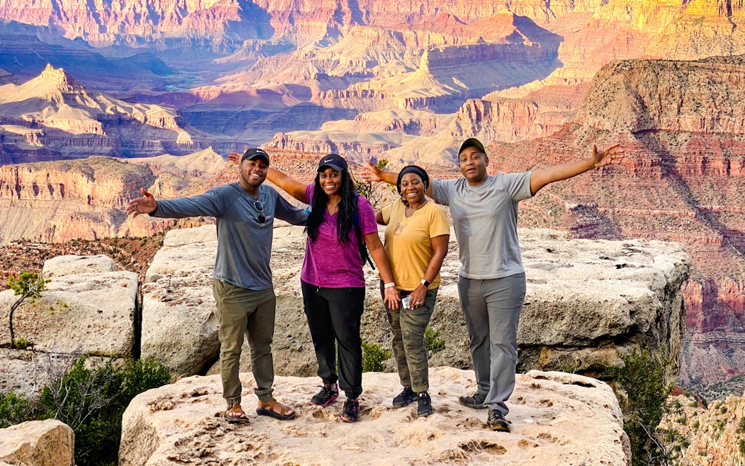 Group enjoying Grand Canyon view on Las Vegas to Grand Canyon airplane and Hummer tour.