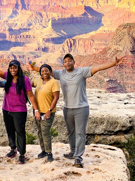 Group enjoying Grand Canyon view on Las Vegas to Grand Canyon airplane and Hummer tour.