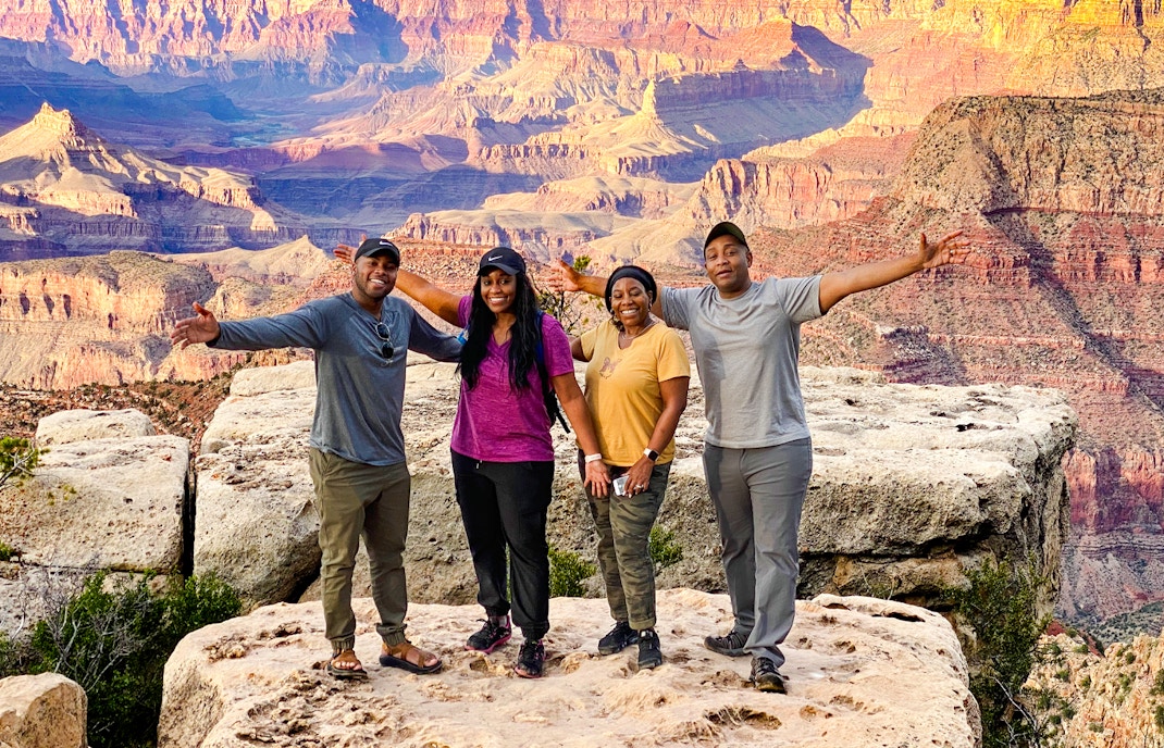 Guests getting a picture taken at Grand Canyon