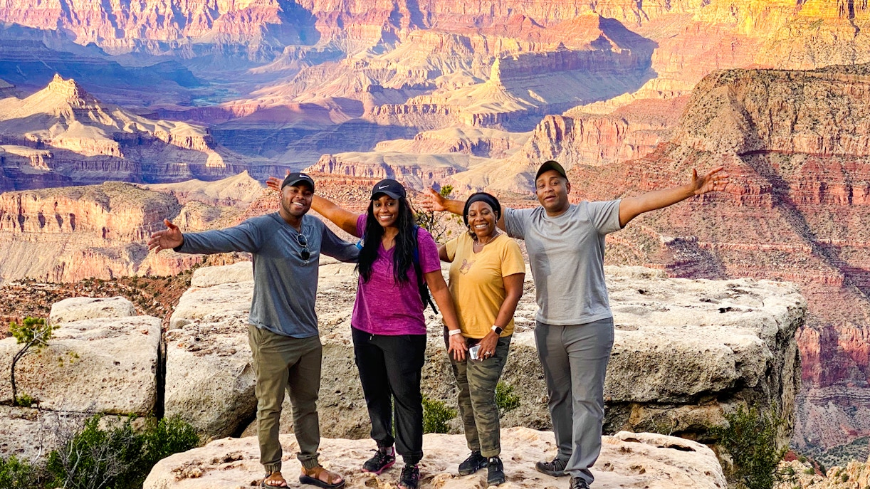 Group enjoying Grand Canyon view on Las Vegas to Grand Canyon airplane and Hummer tour.