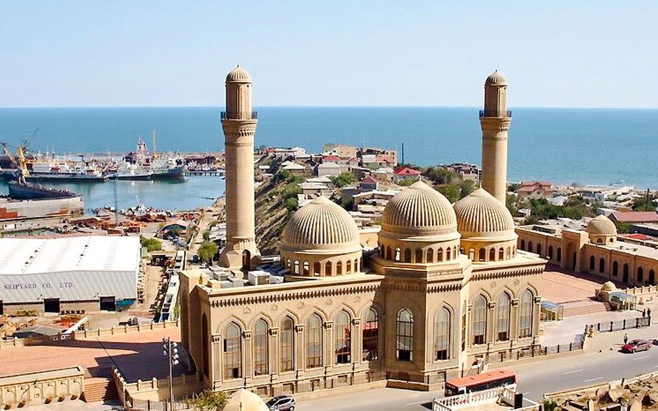 Gobustan National Park mosque with sea and town view in Azerbaijan.
