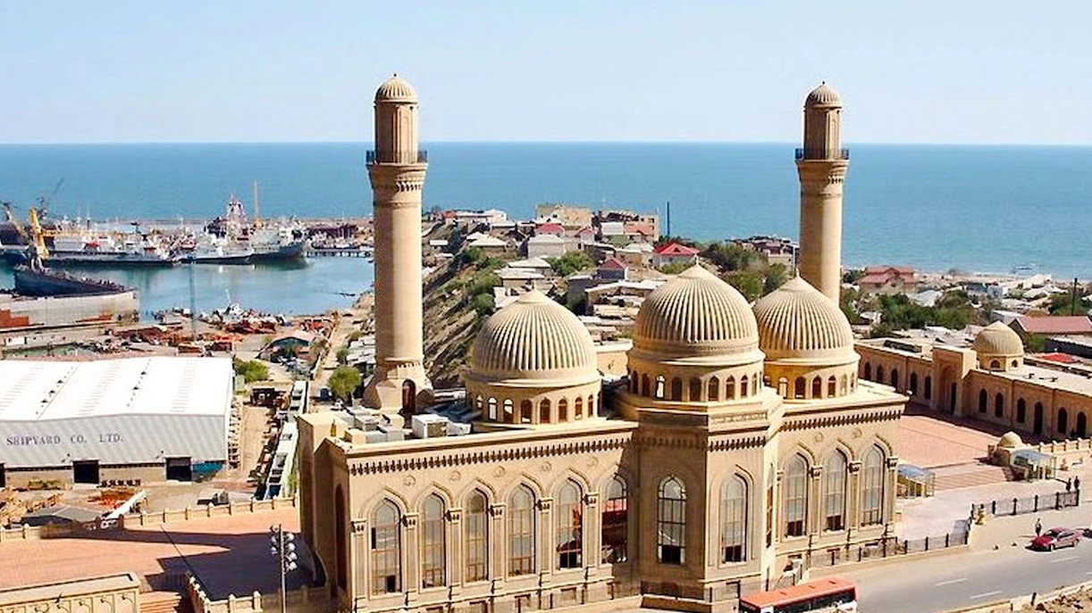 Gobustan National Park mosque with sea and town view in Azerbaijan.