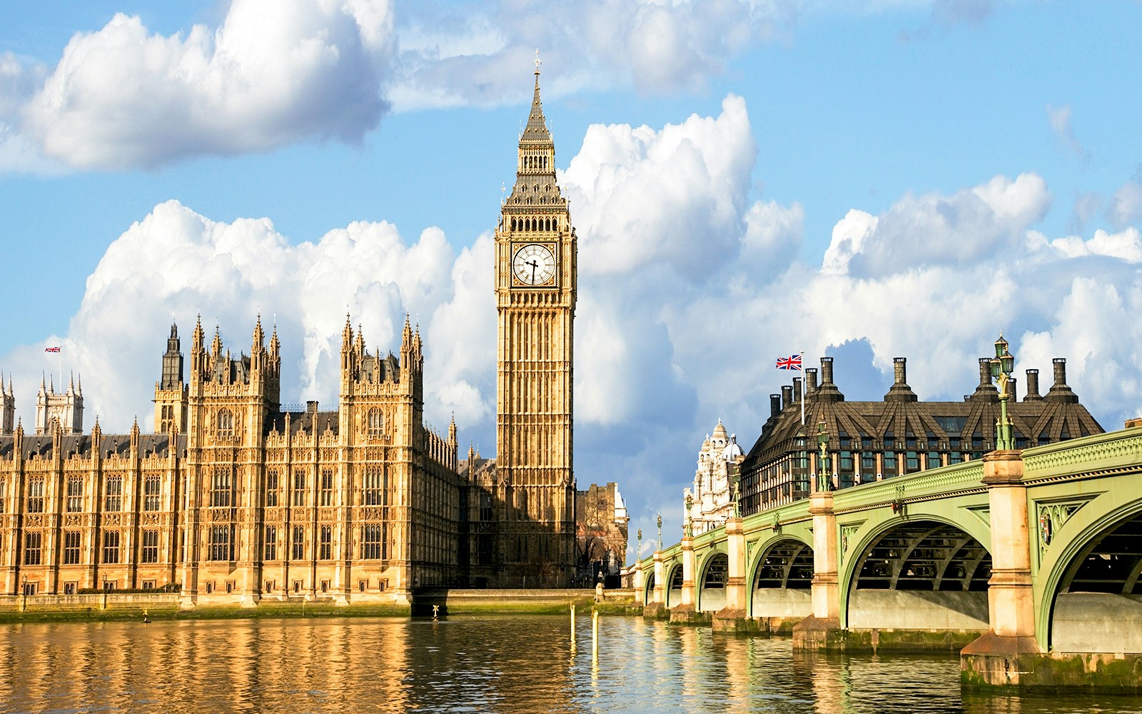 Big Ben and Houses of Parliament viewed from a Thames River cruise in London.