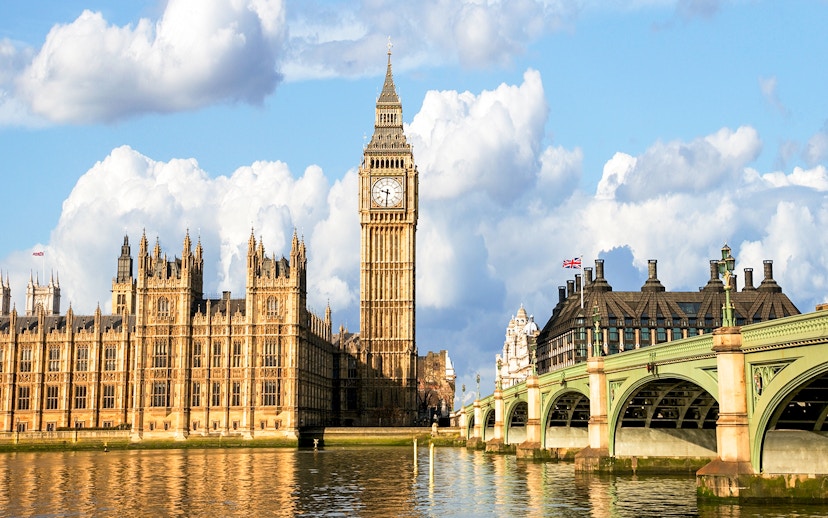 Big Ben and Houses of Parliament viewed from a Thames cruise in London.