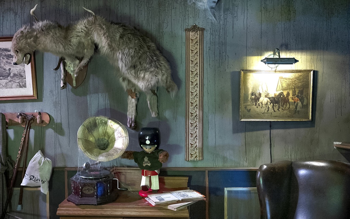Vintage decor with taxidermy, gramophone, and toy soldier at Tivoli Gardens, Copenhagen.
