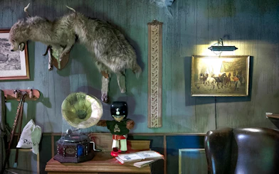 Vintage decor with taxidermy, gramophone, and toy soldier at Tivoli Gardens, Copenhagen.
