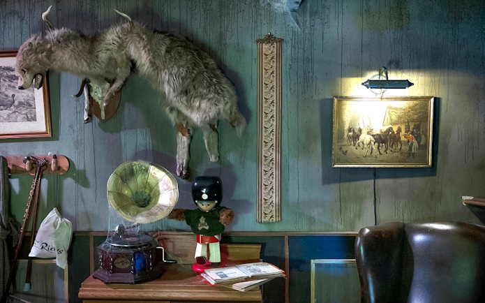 Vintage decor with taxidermy, gramophone, and toy soldier at Tivoli Gardens, Copenhagen.
