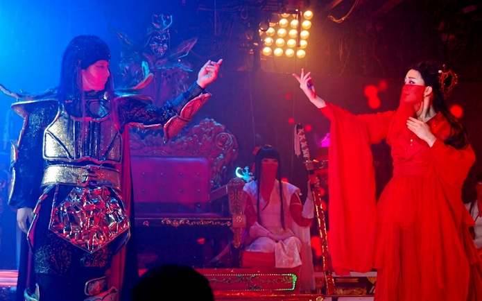 Samurai performers in traditional costumes during a show in Kabukicho, Shinjuku, Tokyo.
