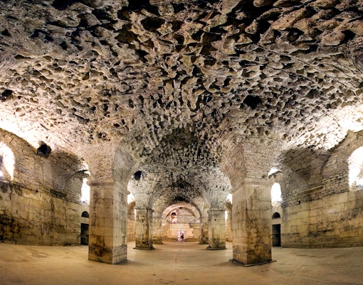 Underground halls of Diocletian's Palace in Split, showcasing ancient stone architecture.