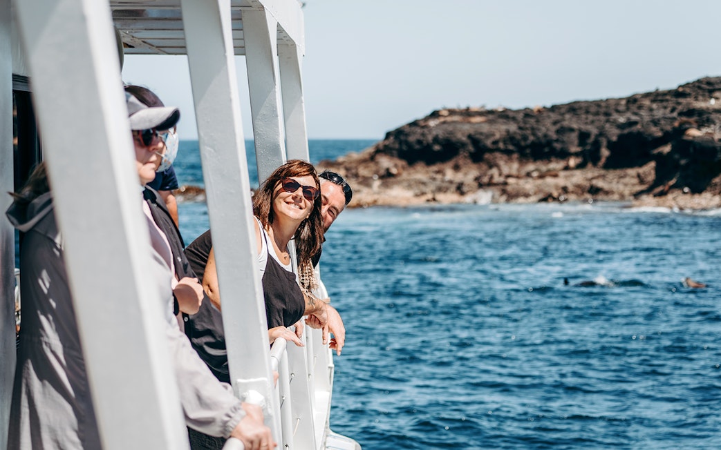 Visitors enjoying a seal watching cruise at Phillip Island.