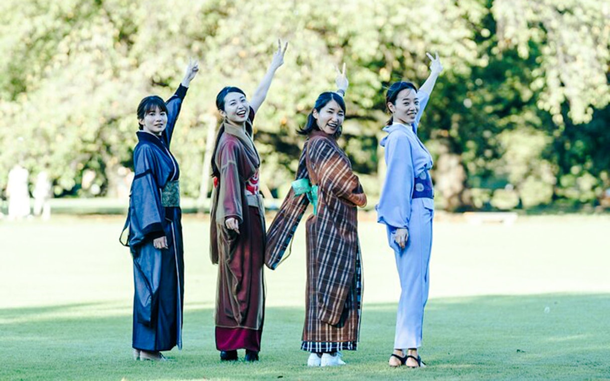 Tourists in kimonos posing at Tokyo Matcha & Kimono Experience.
