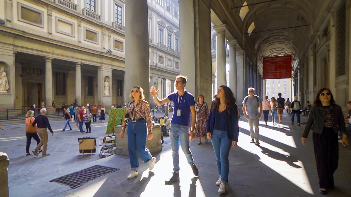 Florence city tour with visitors exploring Renaissance art at Accademia and Uffizi Gallery.