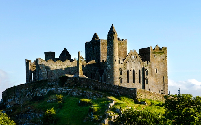 Rock of Cashel exterior with medieval stone structures in County Tipperary, Ireland.