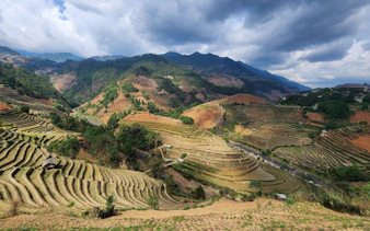 Terraced rice fields in Mu Cang Chai, Vietnam, viewed during a private car tour with a local guide.