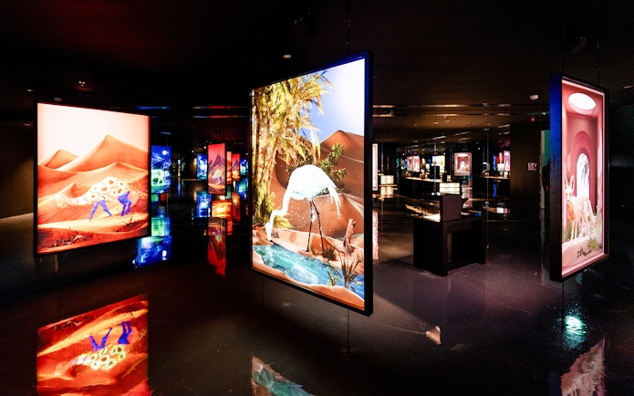 Live canvas sketch display at Arte Museum Dubai exhibit.