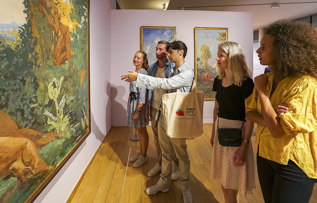Tour group looking at Claude Monet's art