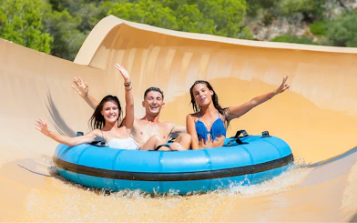 Group enjoying the Grand Canyon water slide at Western Water Park.