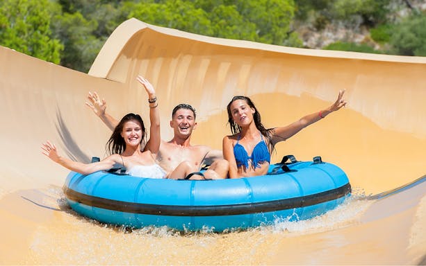 Group enjoying the Grand Canyon water slide at Western Water Park.