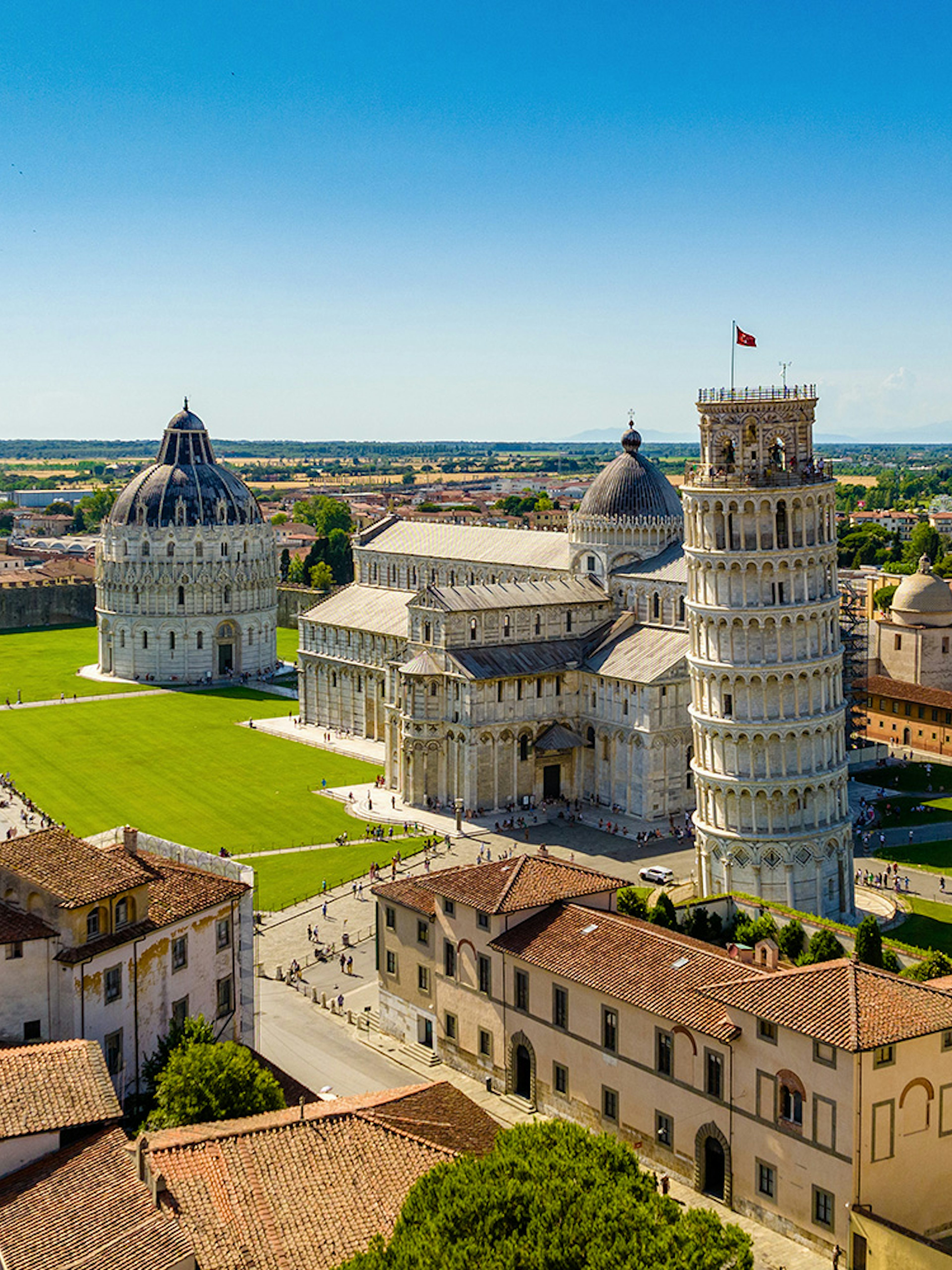 Aerial view of Pisa's Leaning Tower, Cathedral, and Baptistery in Italy.