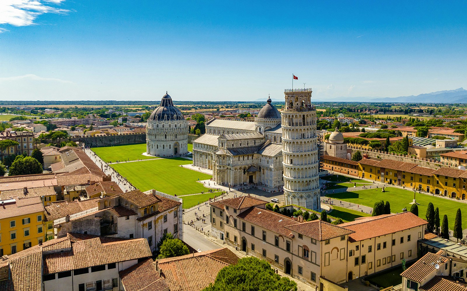 Aerial view of Pisa's Leaning Tower, Cathedral, and Baptistery in Italy.
