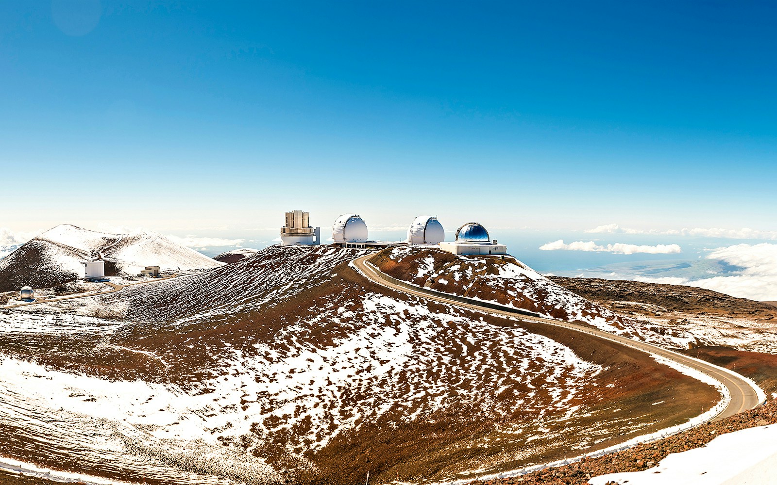 Mauna Kea observatories on snow-dusted summit, Big Island, Hawaii.