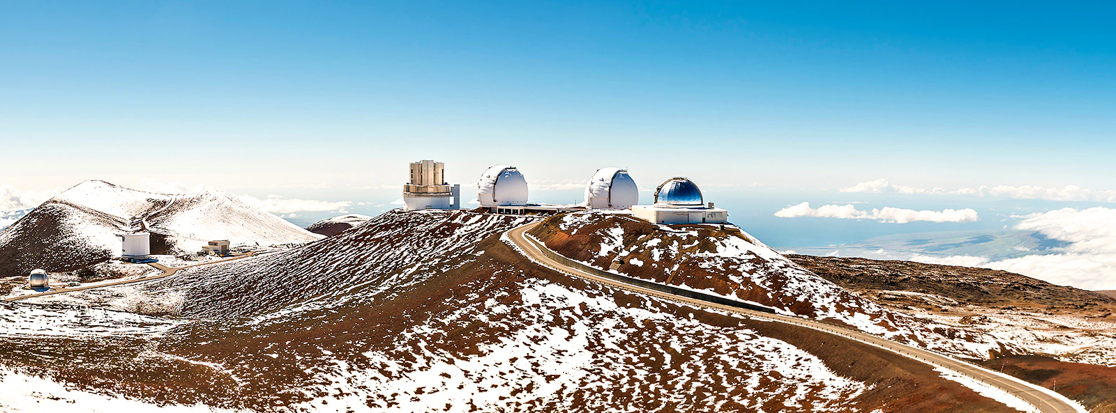 Mauna Kea observatories on snow-dusted summit, Big Island, Hawaii.