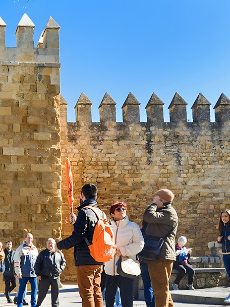 Tour group at the entrance of the Alcázar in Córdoba's Jewish Quarter.