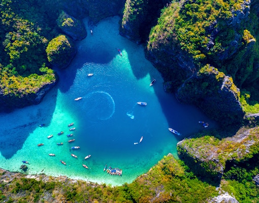 Pileh Lagoon with emerald-green waters and limestone cliffs in Thailand.