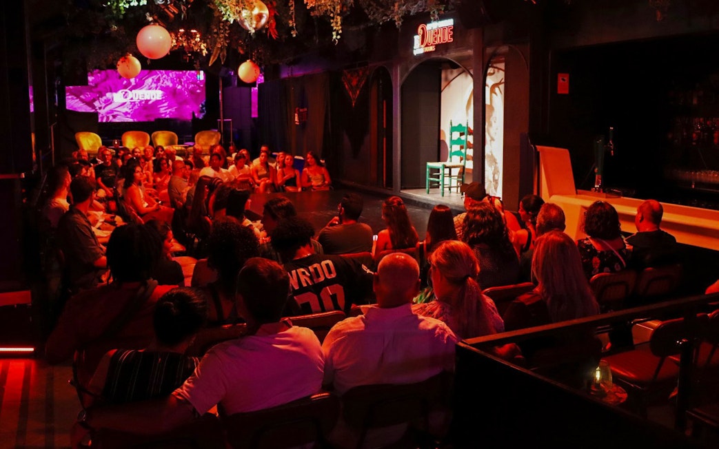 Audience seated at El Duende by Tablao Cordobes, awaiting a flamenco show.