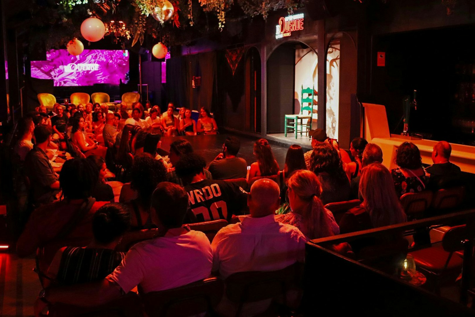 Audience seated at El Duende by Tablao Cordobes, awaiting a flamenco show.