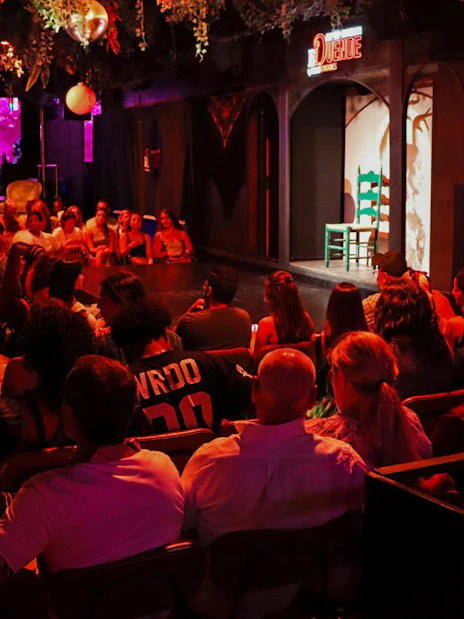 Audience seated at El Duende by Tablao Cordobes, awaiting a flamenco show.