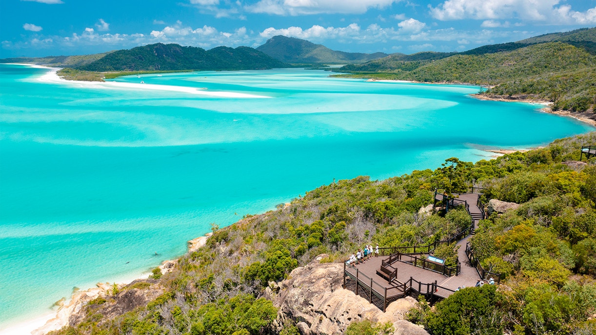 Hill Inlet view of turquoise waters and lush greenery on Whitsundays Snorkel Cruise from Airlie Beach.