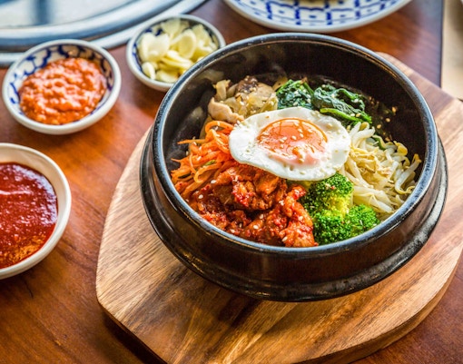 Korean bibimbap with egg and vegetables at Lotte World Theme Park.