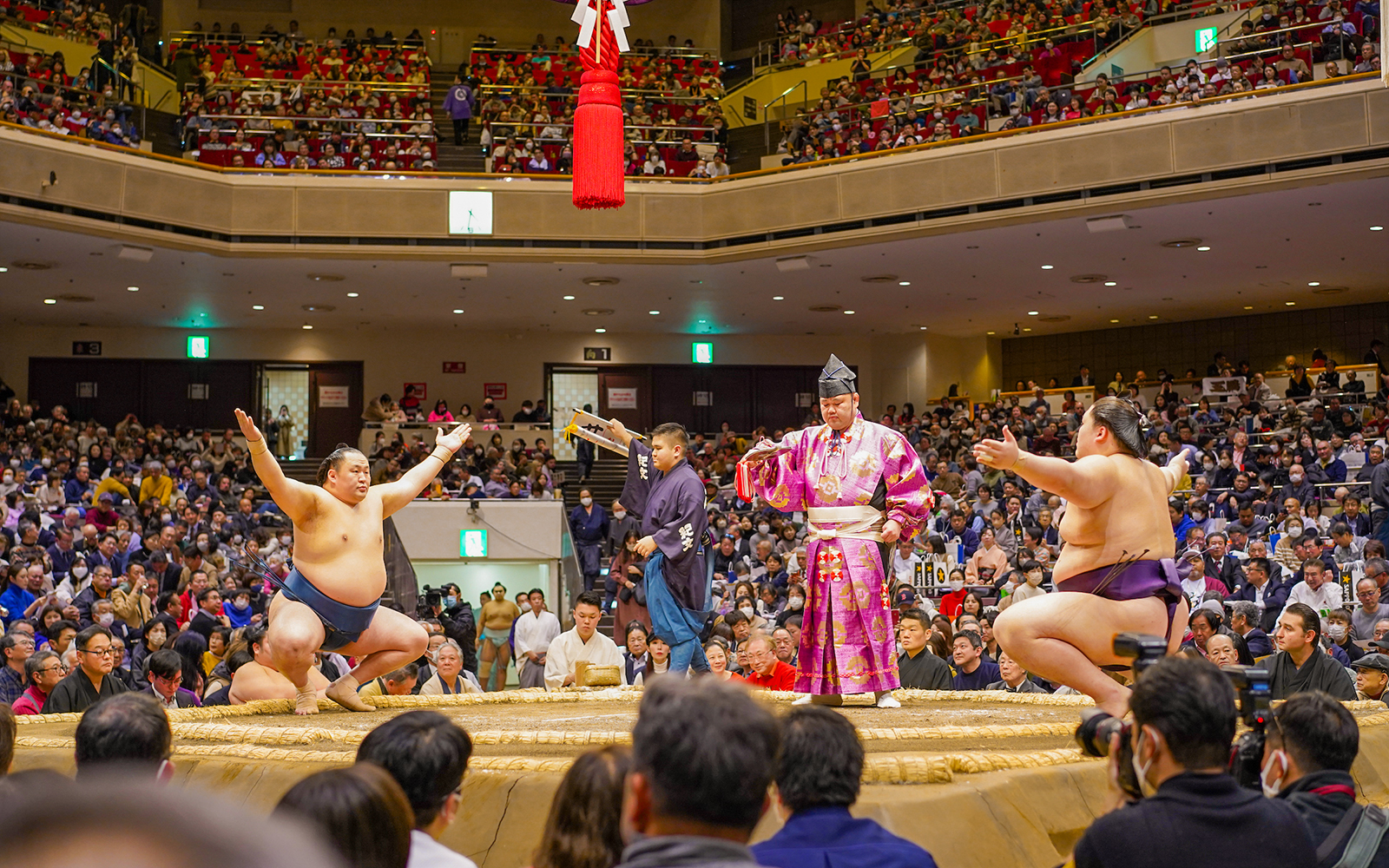 Sumo wrestlers face off at Tokyo Sumo Wrestling Tournament in Ryogoku arena.