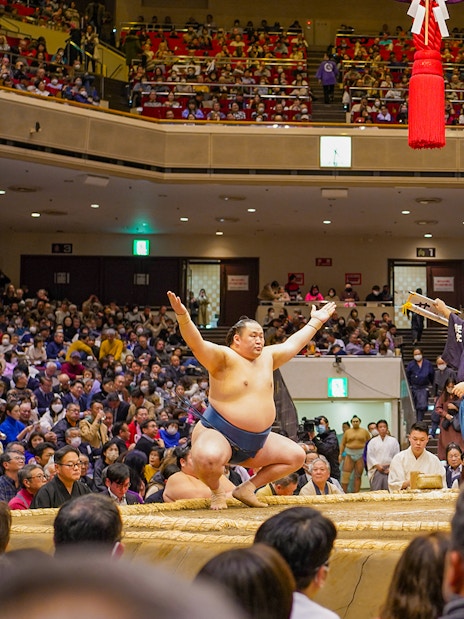 Sumo wrestlers face off at Tokyo Sumo Wrestling Tournament in Ryogoku arena.