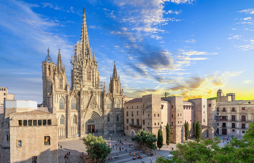 Aerial view of colorful buildings and streets in Barcelona neighborhood.