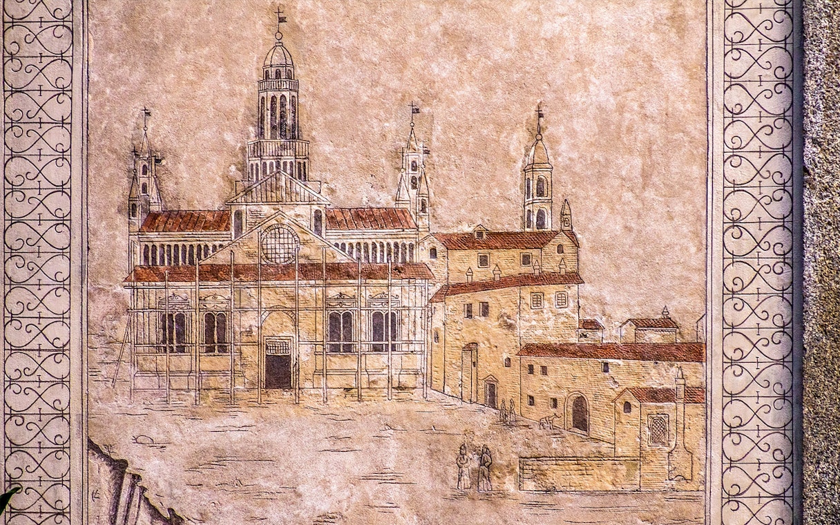Drawing of Milan Cathedral on textured wall, part of Official Milano Pass tour.