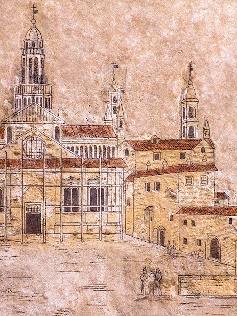 Drawing of Milan Cathedral on textured wall, part of Official Milano Pass tour.
